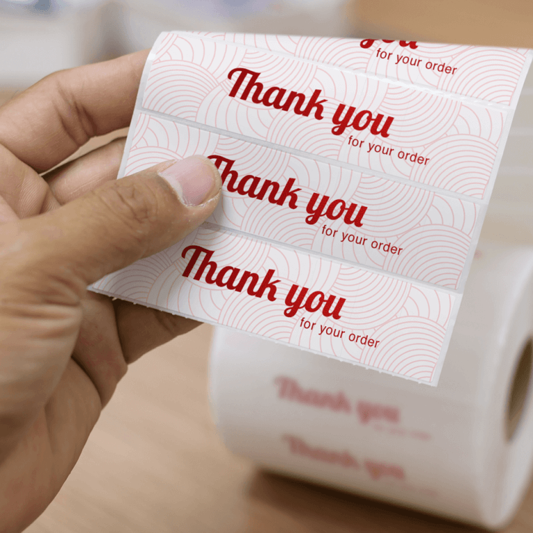 Stickers op rol met foliedruk